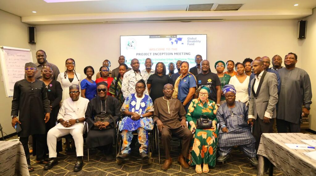 Group photograph of JONAPWD representatives, government officials, Organisations of Persons with Disabilities (OPDs), and other stakeholders at the inception meeting of the project, “Advancing Disability-Inclusive Urban Resilience through Community-Led Innovations and Accessibility Solutions,” supported by the United Nations Global Disability Fund (GDF). The meeting focused on advancing accessible, climate-resilient and inclusive cities through community participation, disability-inclusive data and improved urban planning.